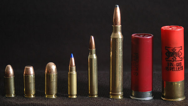 Three non-bottlenecked cartridges (9×19mm Parabellum, .40 S&W and .45 ACP) on the left, three bottlenecked cartridges (FN 5.7×28mm, 5.56×45mm NATO and