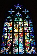 Mucha's stained glass window in St. Vitus Cathedral inside Prague Castle