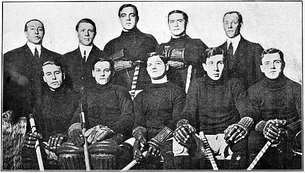 Cleghorn, second from right in the front row, with the 1910 New York Wanderers, with brother Odie seated far right.