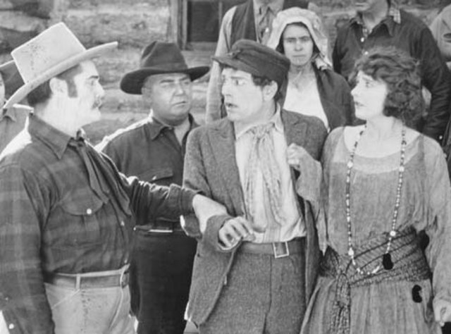 Still (left to right) of Melbourne MacDowell, Lon Chaney and Blythe in Nomads of the North, 1920