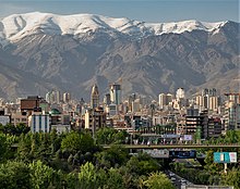 Tehran, the capital and largest city of Iran, and the capital of the Persian Empires in the last two centuries North of Tehran Skyline view.jpg