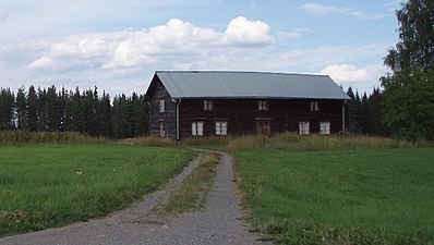 Mangårdsbyggnaden, en parstuga, vid Nylands äldsta gård "Nyströmsgården".