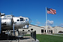 The museum's Boeing B-17G Flying Fortress undergoing restoration to flight. Planes of Fame Museum Entrance lrg.jpg