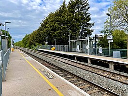 Platform 2 from Platform 1 of Castle Bar Park station, 2021.jpg