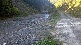 Rauhensackbach with barriers at an altitude of approx. 1000 m