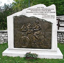 Scissors grinder monument in Stolvizza in the Resia Valley Resiatal Stolvizza Scherenschleiferdenkmal - Retusche.jpg