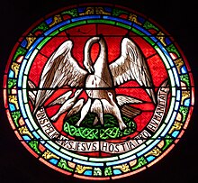 Stained glass depiction of The Pelican in Her Piety from a Catholic church in Saint-Bonnet-la-Riviera, France. Saint-Bonnet-la-Riviere eglise oculus.jpg