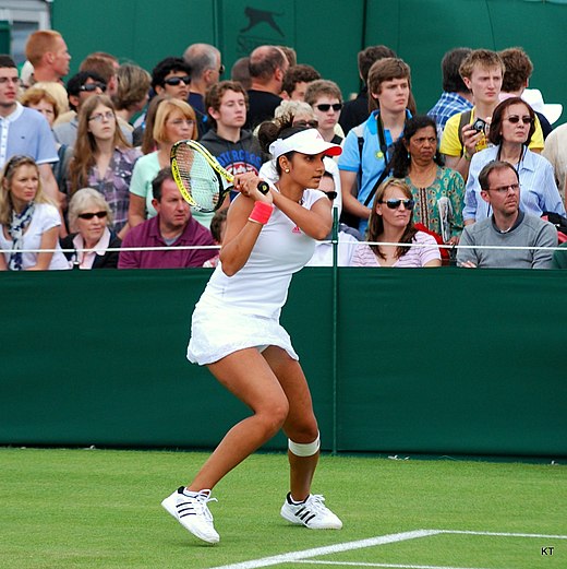 Mirza during her match with Virginie Razzano at Wimbledon, 2011
