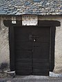 Sant Joan d'Arties puerta con placa.jpg