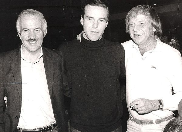 (from left) producer Stanley O'Toole, Dennis Quaid, director Wolfgang Petersen while filming Enemy Mine in 1984