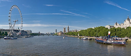 The Thames passes by some of the sights of London, including the Houses of Parliament and the London Eye