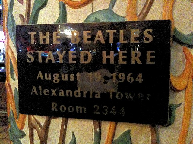 Plaque describing the Beatles' hotel stay in 1964.