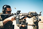 URG-I variant M4A1 carbine has M-LOK rail handguard with an LA-5C/PEQ top rail used by one of the Green Berets from 3rd SFG (A) during training at Marine Corps Air Ground Combat Center, Twentynine Palms, California in 2019.