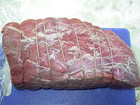 A 3 kilograms (6.6 lb) top round roast of beef, tied and ready to be browned and roasted
