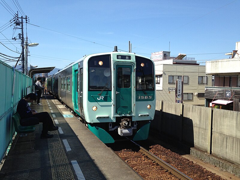 File:Train for Tokushima Station arriving at Awa-Tomida Station.jpg