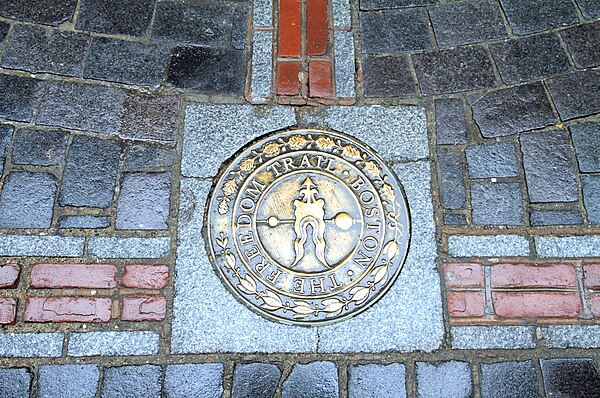 Special markers implanted in the sidewalk denote the stops along the Freedom Trail