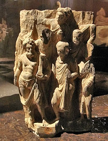 The Zeus-like Vajrapani was chosen as a protector of the Buddha, art of Gandhara, (Guimet Museum). VajrapaniAndMonks.jpg