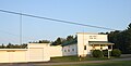 Looking east at the town hall and fire station for w:Wolf River, Langlade County, Wisconsin in w:Langlade County, Wisconsin along w:Wisconsin Highway 55. Template:Commonist