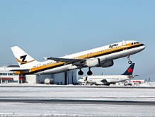 A Zoom Airlines Airbus A320, leased from Monarch Airlines and still in basic Monarch livery, departing from Ottawa Airport Zoom Airlines Airbus A320 Davies-2.jpg