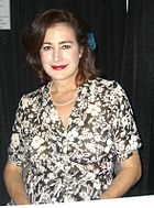 Sean Young (pictured) played the scheming con-artist, Meggie. 10.17.09SeanYoungByLuigiNovi.jpg