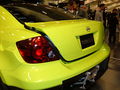 2005 yellow custom Scion tC open trunk 1