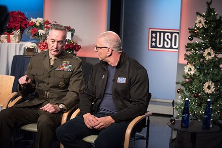 Irvine conversing with US Chairman of the Joint Chiefs of Staff, General Joseph Dunford in December 2016.