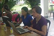 Prof. Joycie Alegre with Rachel Jereza-Pabro judging the works of the participants of the 6th Waray Wikipedia Edit-a-thon at the University of the Philippines Visayas Tacloban College (UPVTC) held on November 18-19, 2016. The event was organized by the The Leyte-Samar Heritage Center of UPVTC and the Sinirangan Bisaya Wikimedia Community.