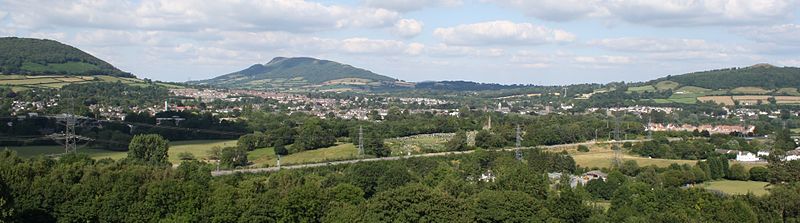 Abergavenny from the Monmouthshire Canal with the Skirrid in the centre with its characteristic notched outline (2014)