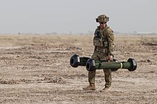 An Australian Army soldier carrying two FGM-148 Javelins at the Besmaya Range Complex in Iraq, October 2016 An Australian soldier carrying two Javelin missiles to a firing point at the Besmaya Range Complex, Iraq, in October 2016.jpg
