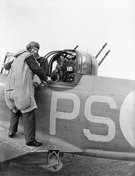 An air-gunner of 264 Squadron wearing a 'GQ Parasuit', or "rhino suit", August 1940