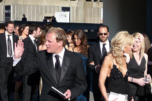 Kelly attending the BAFTAs in 2009, alongside co-star Antony Cotton