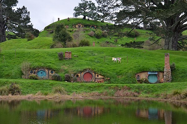 Jackson's version of the Hill at Hobbiton on the Water. The image may be compared with Tolkien's watercolour painting The Hill: Hobbiton-across-the-Wa