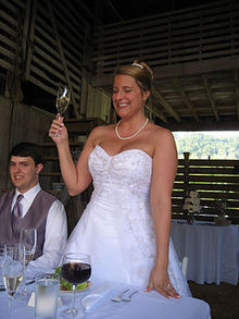 A bride offering a toast at a wedding Bride's toast.jpg