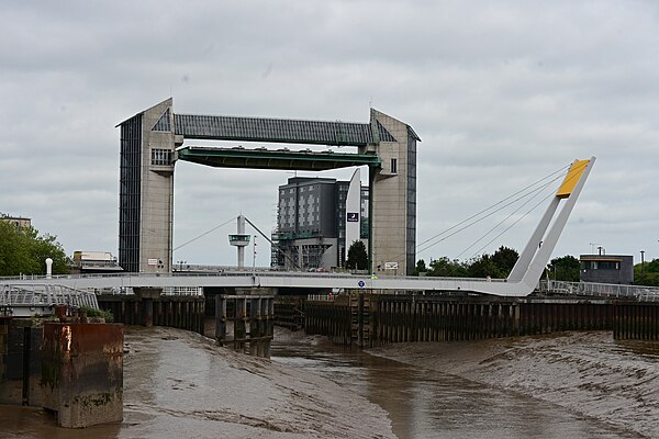 The tidal barrier and the Millennium Bridge at the mouth of the river