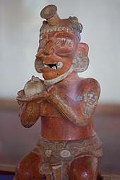 A ceramic censer representing an elderly deity, found in Burial 10 Burial 10 vessel.jpg