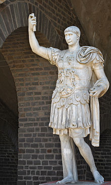 Statue of Trajan in front of the Amphitheater of Colonia Ulpia Traiana in the Xanten Archaeological Park CVT APX Amphitheater Traiansstatue.jpg