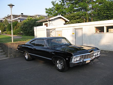 Black '67 Impala, similar to the car in the series Chevrolet Impala 1967 (11695634105).jpg