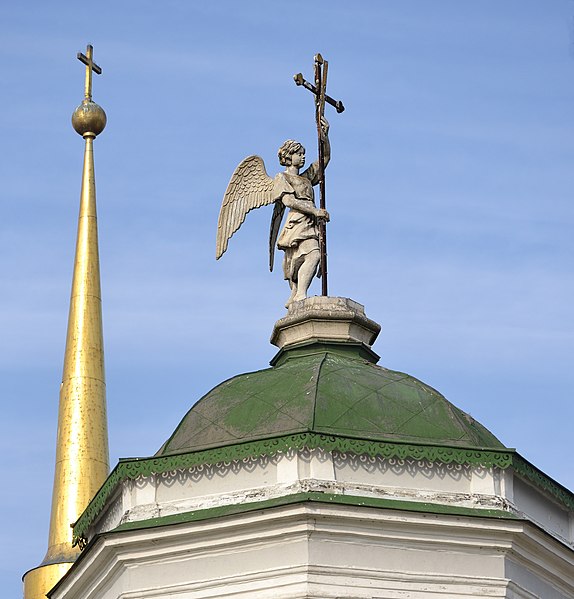 Moscow. Kuskovo. The spire of the bell tower and the figure of an angel on the top of the Church of the Merciful Saviour.