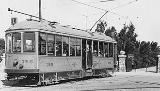 Archival photo of Class 1 streetcar #125 at the Park Ave. entrance to Mission Cliff Gardens in the University Heights neighborhood of San Diego, CA Class 1 Streetcar at Trolley Barn Park.JPG