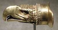 Gold labret in the shape of an eagle's head