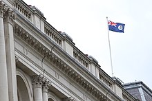 Cayman Islands flag flies at its foreign office Flag of Cayman Islands (28077880745).jpg