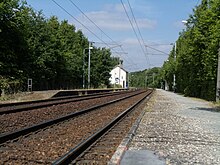 Przegląd platform i torów w kierunku Gisors.