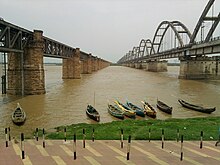 The bridge on the left is the Old Godavari Bridge or the Havelock Bridge (decommissioned). Godavari Bridge2.jpg