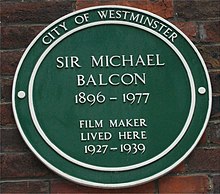 Green plaque on Balcon's house in Tufton Street, Westminster Green plaque Michael Balcon.jpg