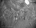 Group of workers posing in the Snoqulamie Tunnel to the Cascades for the Chicago, Milwaukee and St Paul Railway Co, Washington (TRANSPORT 1019).jpg