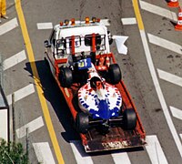 A bizarre incident in Saturday practice saw the Renault Clio safety car crash into Taki Inoue's stalled Footwork. Inoue Footwork Monaco.jpg