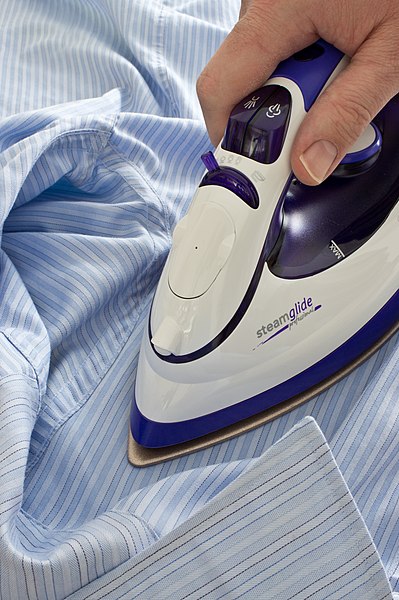 File:Ironing a shirt.jpg