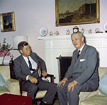 President John F. Kennedy (left) meets with the Prime Minister of the United Kingdom, Harold Macmillan (right), at Government House in Hamilton, Bermuda, on 22 December 1961. KN-C19791. President John F. Kennedy Meets with Prime Minister Harold Macmillan of Great Britain in Bermuda.jpg