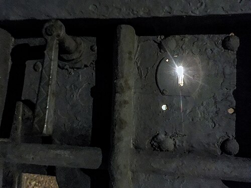 Keyhole in a wrought iron door, Rome