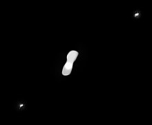 Kleopatra and its two moons imaged by VLT-SPHERE in 2017 Kleopatra moons - eso2113e.jpg